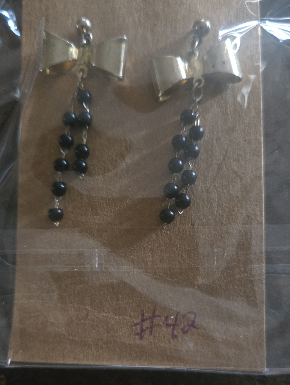 Bow Drop Earrings with Black Beaded Tassels